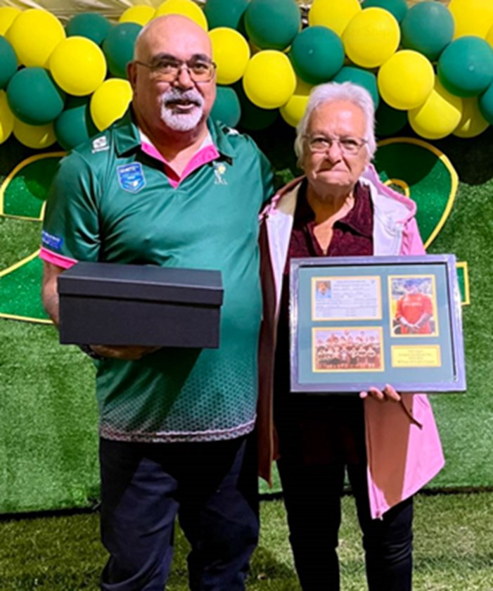 Jeff Logan with his 50th 'presents' and his mum, Maureen.