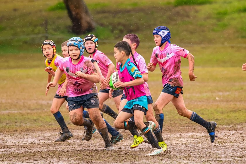 The boys proudly playing in their pink jerseys. Photos: Hesti Photography